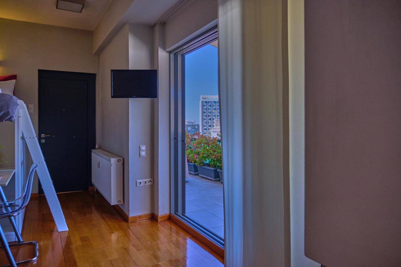 Homz Ah03 Penthouse Studio Hilton Area Athena Bagian luar foto